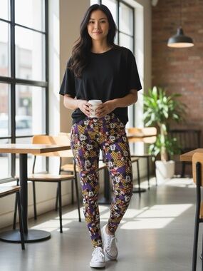 LuLaRoe Purple, Yellow & Black Character Patchwork Leggings
